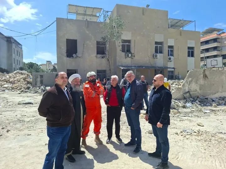 The mayor and members of the Sidon municipality inspect the site of the attack in the 'Zahraa Complex' and follow up on the debris removal operations and the assessment of damages to the surrounding civilian buildings.