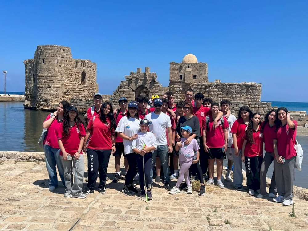 Under the supervision of the Environment Committee, students of the Evangelical Arts School participate in a beach cleaning campaign in the vicinity of Saida Sea Castle.